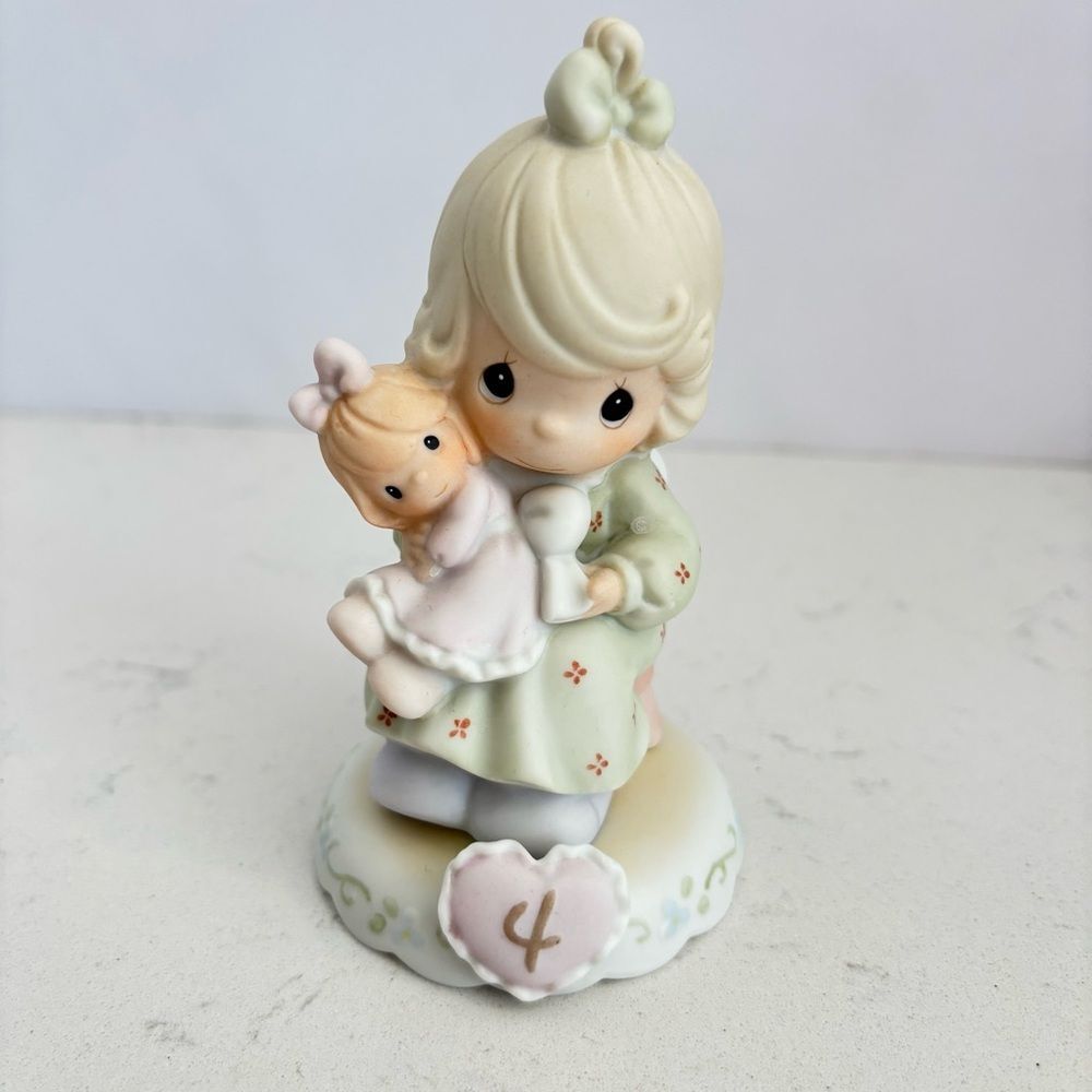 Precious Moments “Growing in Grace – Age 4” Figurine (1994)